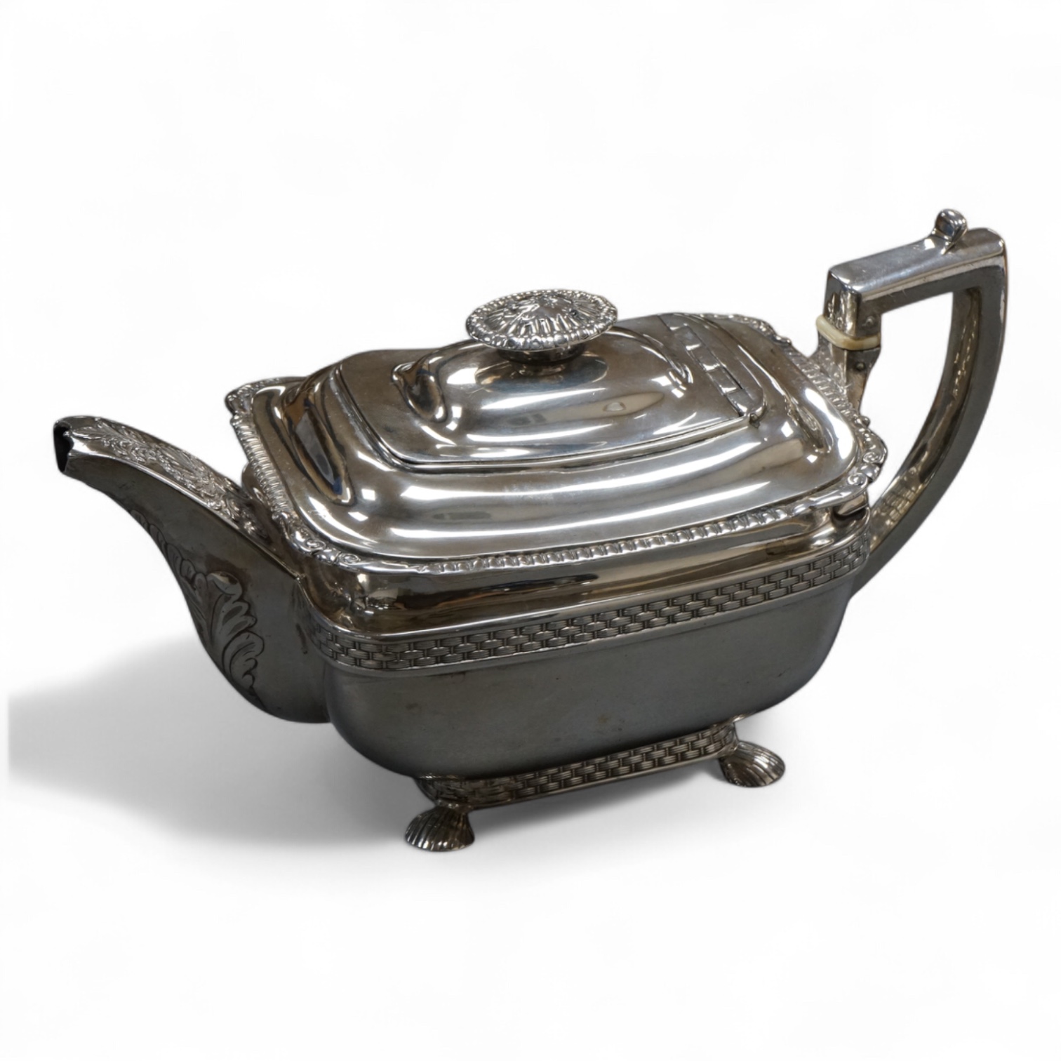 A George III silver oblong teapot by Daniel Pontifex, London, 1809, decorated with 'basket weave' bands, gross weight 26,2oz., CITES Submission reference, 712SNDFP